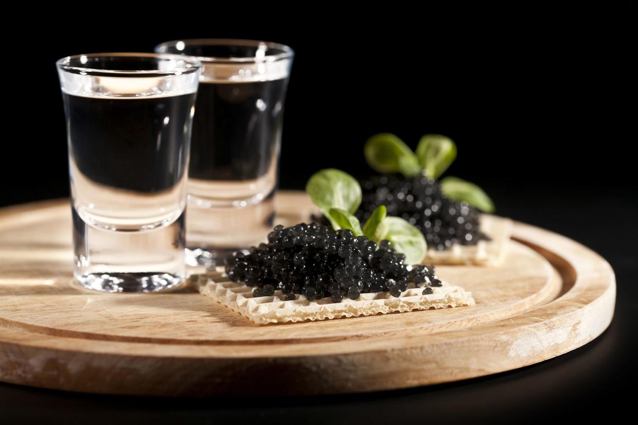 vodka and sandwiches with black caviar