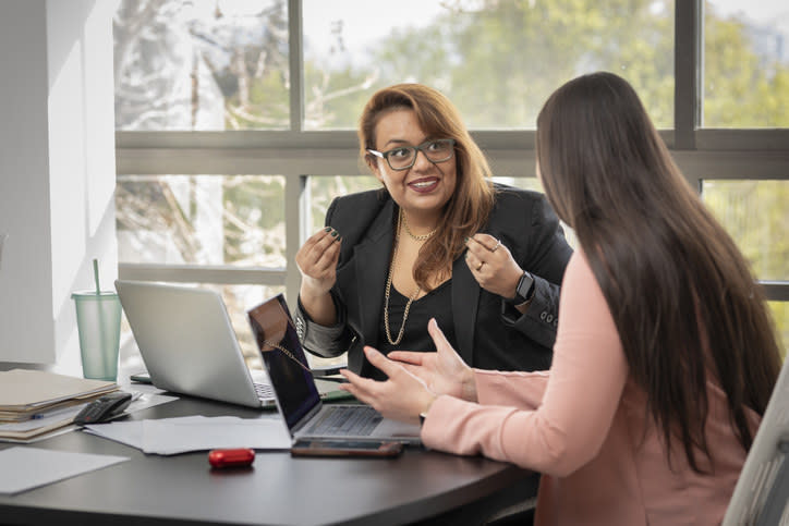 Two women working in an office