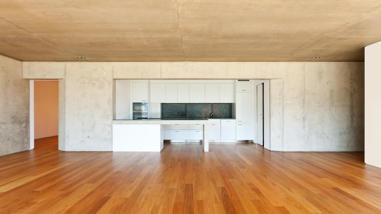 modern concrete house with hardwood floor,  kitchen.