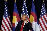 U.S. Republican presidential nominee Donald Trump puts his hand to his ear as he speaks at a campaign rally in Pueblo, Colorado, U.S., October 3, 2016. REUTERS/Mike Segar