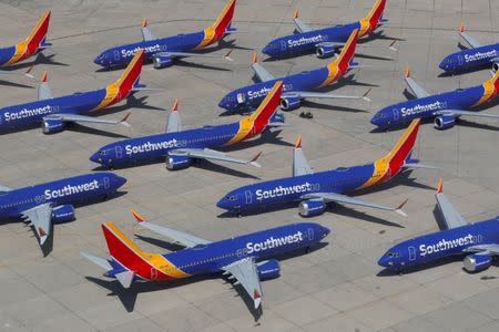 A number of grounded Southwest Airlines Boeing 737 MAX 8 aircraft are shown parked at Victorville Airport in Victorville, California, U.S., March 26, 2019. REUTERS/Mike Blake/Files