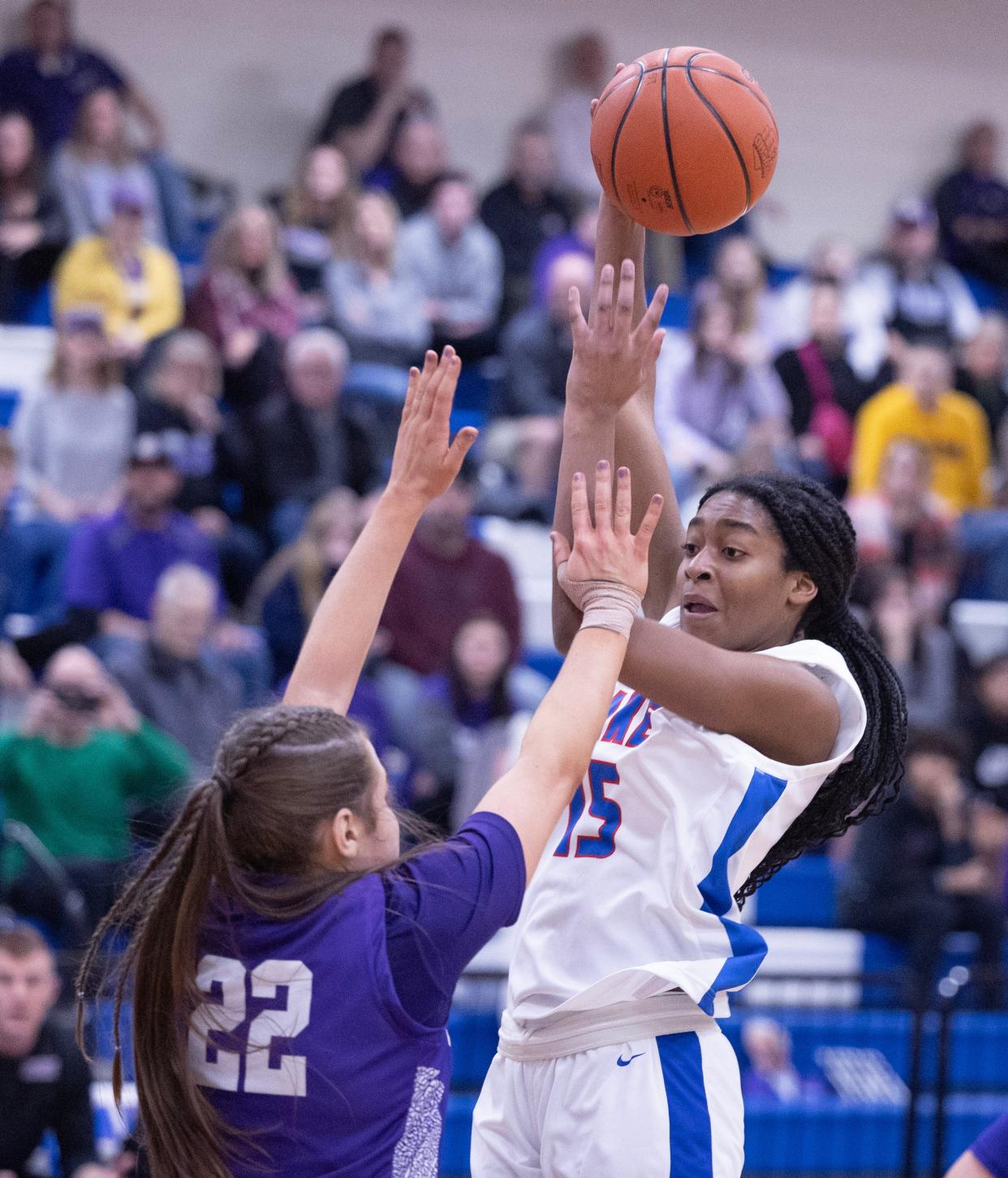 Lakes Serenitee Johnson shoots with pressure over Jackson's Megan Campbell in the first half, Wednesday, Jan. 24, 2024.