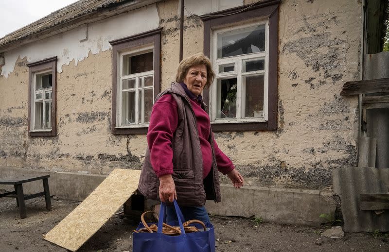 A local resident evacuates to Kharkiv due to Russian shelling in the town of Vovchansk