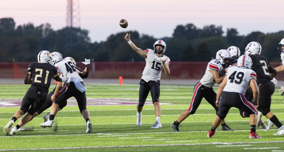 McDonald County QB Destyn Dowd throws a pass at Logan-Rogersville on September 9, 2022.