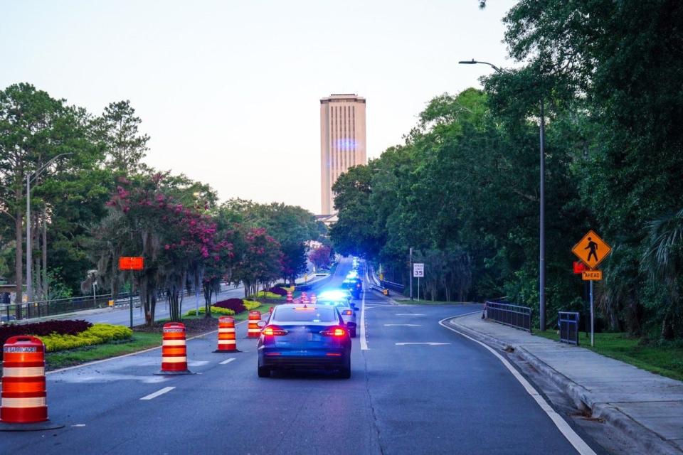 An escort of Tallahassee Police officers forms down Apalachee Parkway in memory of an officer killed in the line of duty Wednesday, June 8, 2022.