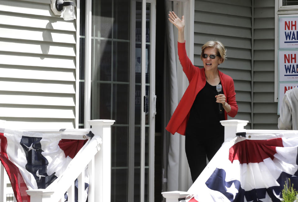 Democratic presidential candidate Sen. Elizabeth Warren, D-Mass., waves as she arrives at a campaign house party, Friday, June 14, 2019, in Windham, N.H. (AP Photo/Elise Amendola)