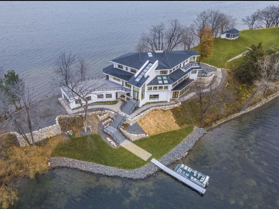 The house sits on an island in the middle of Bald Eagle Lake, Minnesota