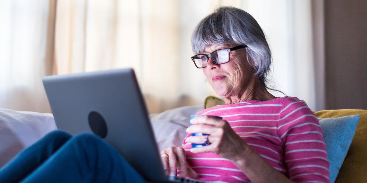 older woman using laptop computer