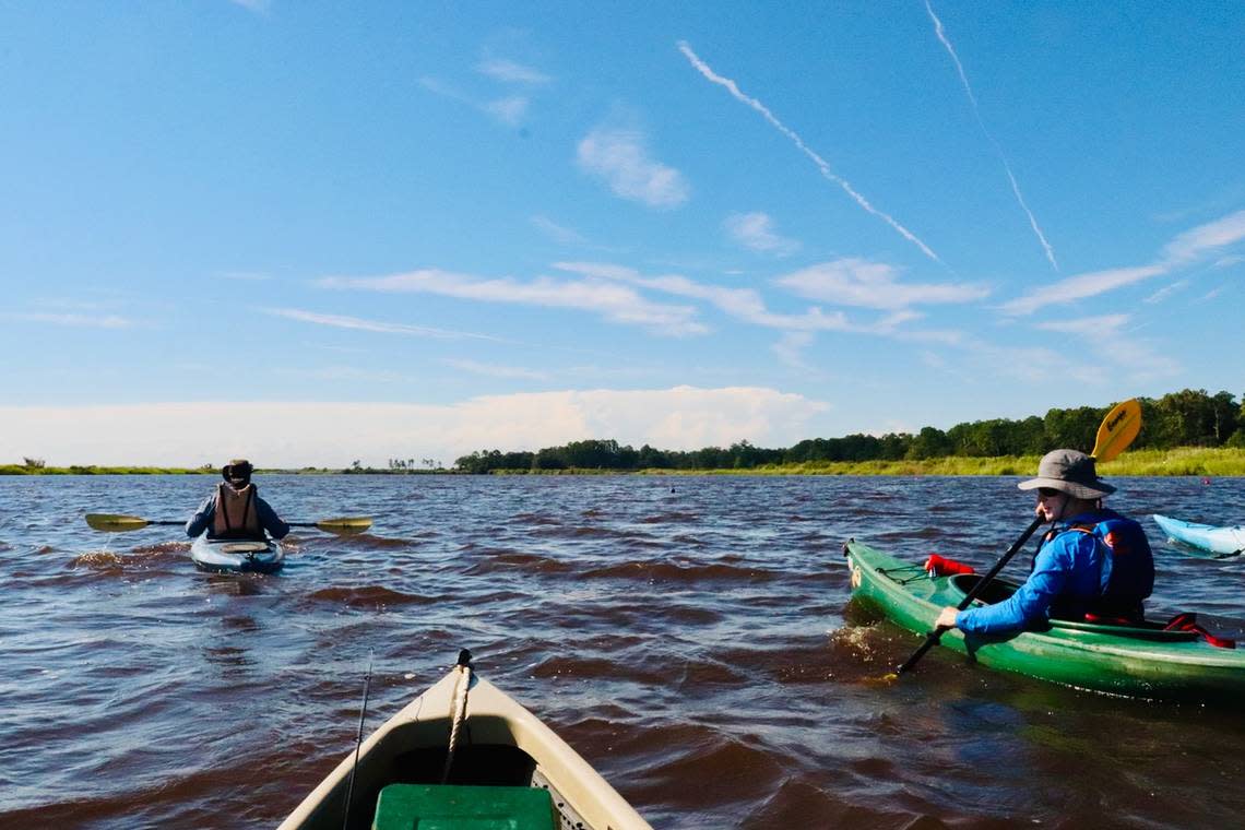 From the landing at Harriet Tubman Bridge, where Highway 17 crosses into Beaufort County, to Wimbee Landing near Seabrook, is a distance of about seven miles. A trip by boat or kayak will take you through some of the most beautiful coastal scenery in the Lowcountry. Here, kayakers Scott Hansen of Seabrook, Jared Ross of Charleston, and Alan Eisenman of Beaufort enjoy a paddle along the Combahee River.