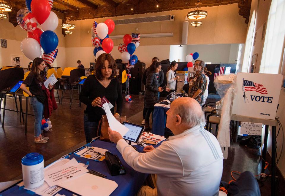 Residents cast their ballots during the Democratic presidential primary in Beverly Hills, California, on March 3, 2020.