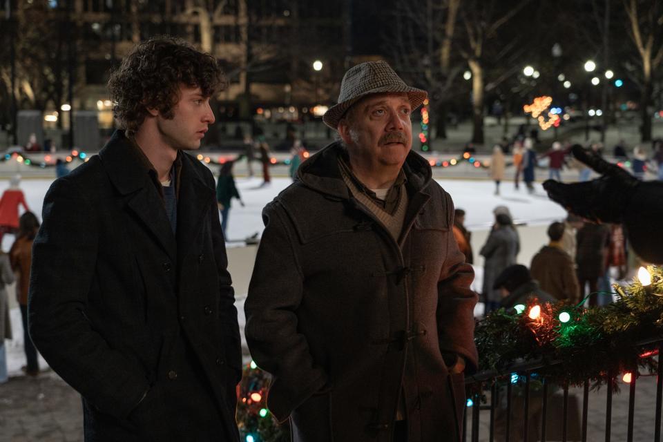 With the skating oval on Worcester Common in the background, Dominic Sessa and Paul Giamatti film a scene of "The Holdovers."