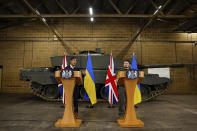 British Prime Minister Rishi Sunak and Ukrainian President Volodymyr Zelenskyy hold a news conference at a military facility in Lulworth, Dorset, England, Wednesday Feb. 8, 2023. (Peter Nicholls/Pool via AP)