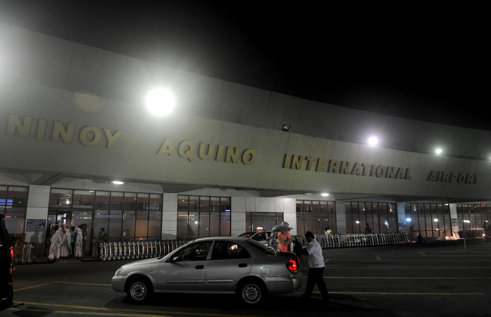 A passenger arrives at the Ninoy Aquino International Airport in Manila, the Philippines. (Photo: Getty Images)