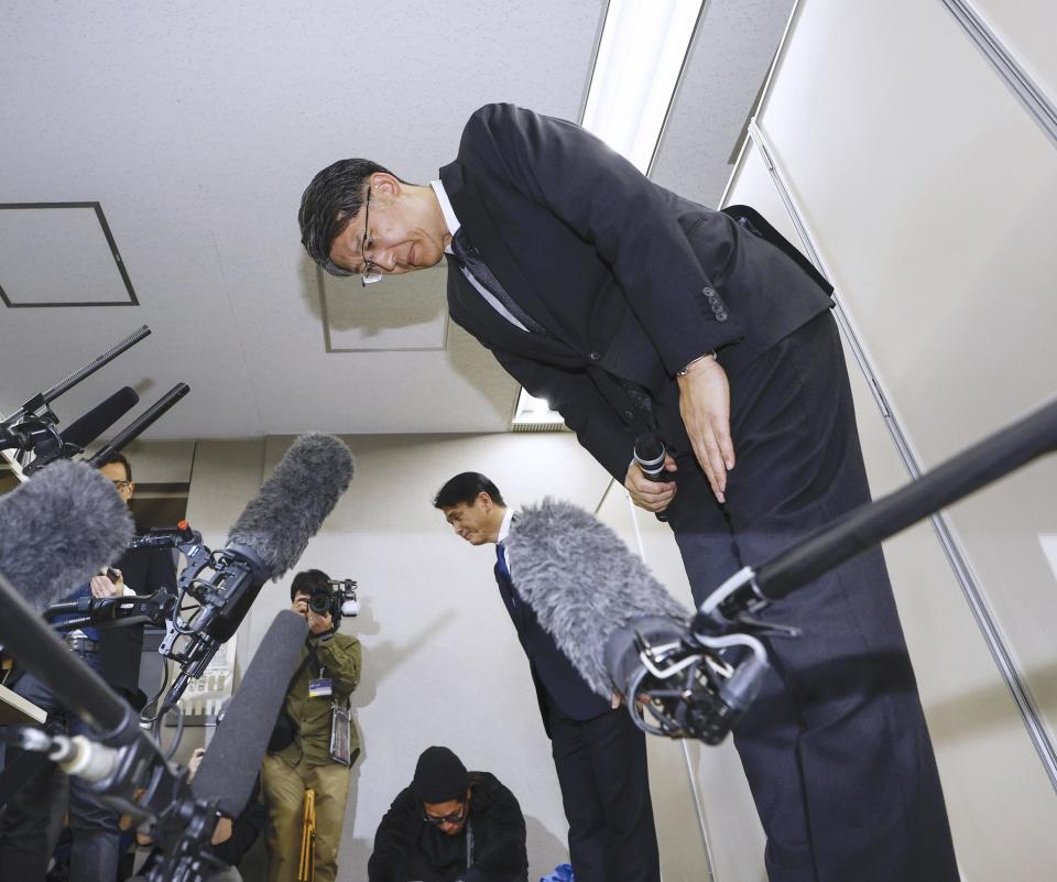 Toyota Motor Corp. CEO Koji Sato bows at the end of a news conference, in Tokyo, Japan, Monday, Jan 29, 2024. Toyota Chief Sato apologized Monday to customers, suppliers and dealers for flawed testing at a group company, which follows similar problems in recent years.(Kyodo News via AP)