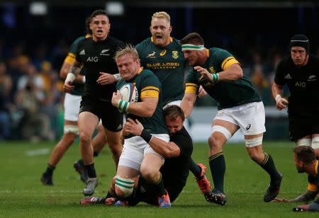 South Africa Rugby Union - Rugby Championship - South Africa's Springboks v New Zealand's All Blacks - Kings Park Stadium, Durban, South Africa - 08/10/2016 South Africa's Adriaan Strauss is tackled by New Zealand's Owen Franks. REUTERS/Rogan Ward