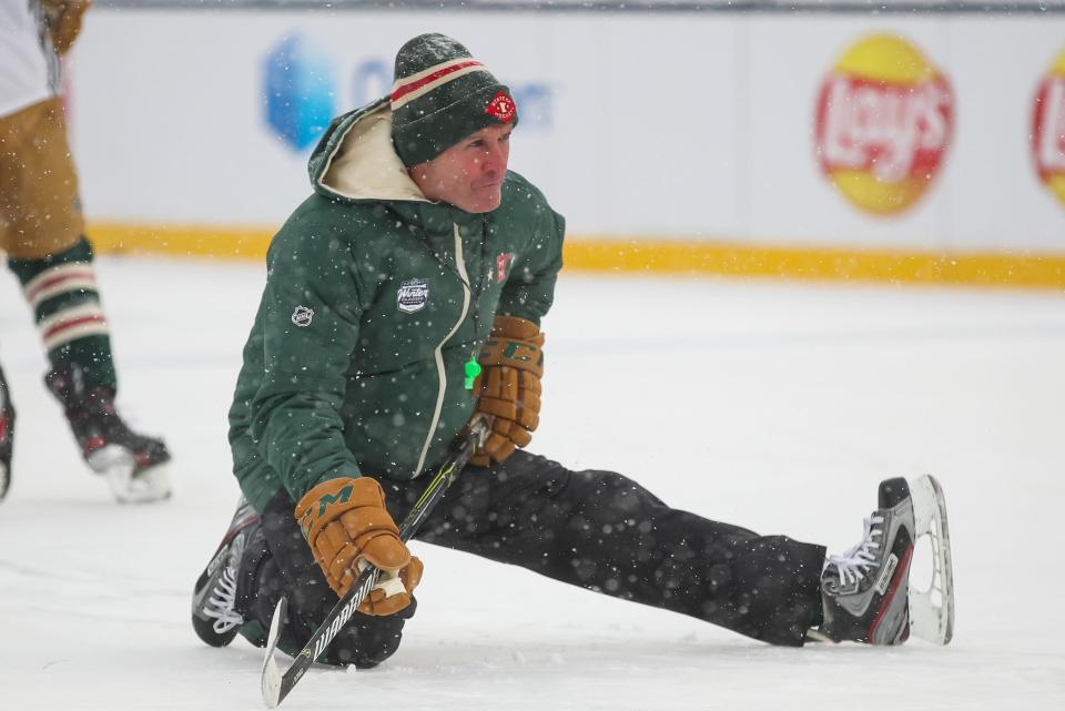 MINNEAPOLIS, MN - DECEMBER 31: Head coach Dean Evason of the Minnesota Wild stretches during practice at Target Field on December 31, 2021 in Minneapolis, Minnesota. (Photo by David Berding/Getty Images)