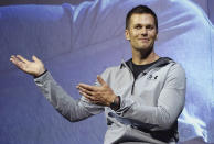 FILE - New England Patriots quarterback Tom Brady gestures during a promotional event, June 22, 2017, in Tokyo. Brady is putting on a Delta Air Lines uniform, at least figuratively. Delta said Wednesday, Sept. 6, 2023, that it has agreed to bring the former star quarterback on board as a long-term strategic adviser. (AP Photo/Eugene Hoshiko, File)