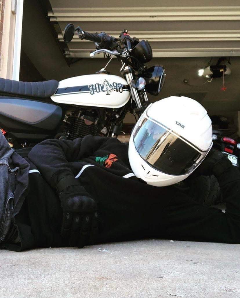 A photo, dated March 15 and provided by family members, shows a helmeted Kolby Dutton posing in front of his beloved motorcycle.