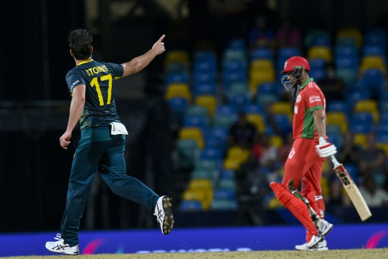 Australia's Marcus Stoinis celebrates the dismissal of Oman's Aqib Ilyas in their T20 World Cup opener in Barbados (Randy Brooks)