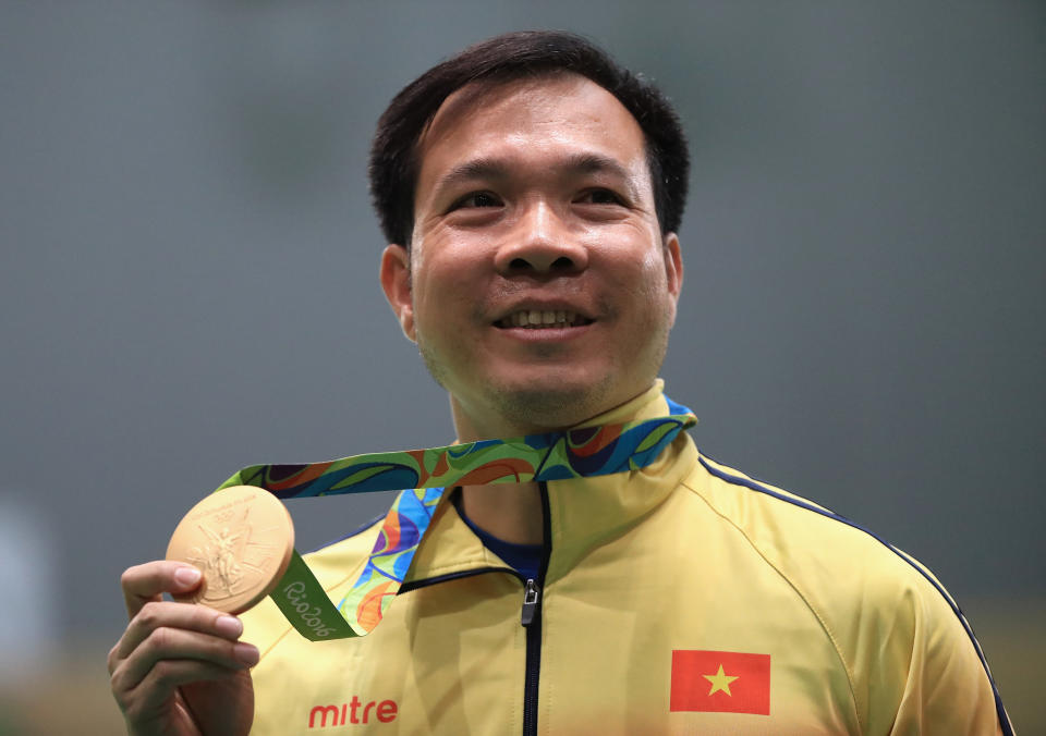 Vietnam shooter Hoang Xuan Vinh is all smiles after winning his country's first Olympic gold medal in the men's 10m air pistol at the 2016 Rio de Janeiro Games. 