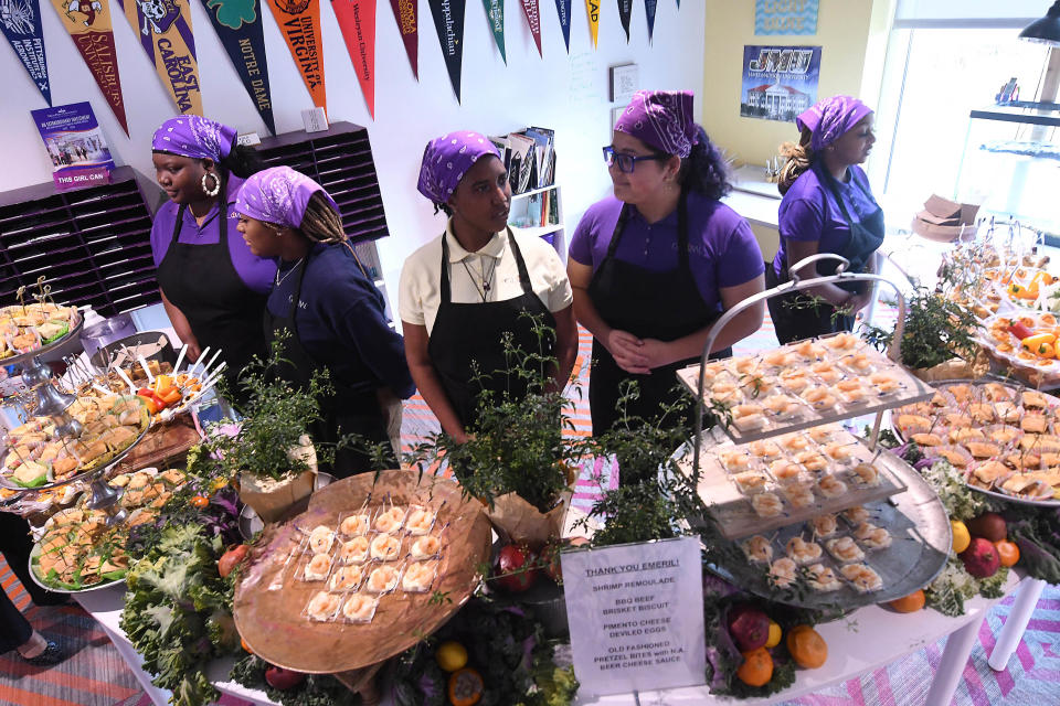 Students in the culinary classroom at GLOW Academy were able to meet with Emeril Lagasse and serve guests dishes they created in the kitchen as he visited GLOW Academy.