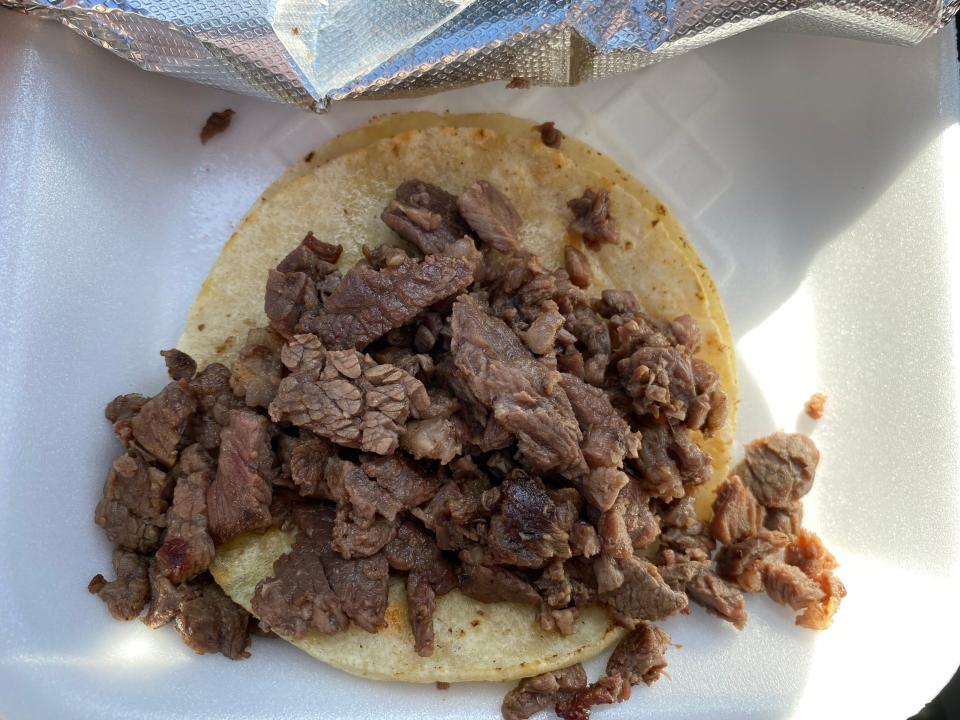 Carne asada taco from Ta'Carbon.