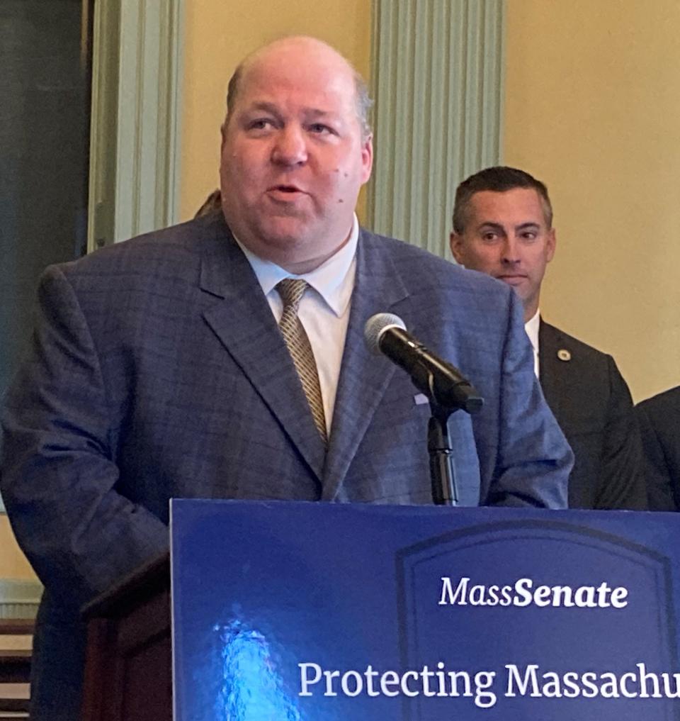 Sen. Paul Feeney, D-Foxborough, announces the passage of three consumer protection measures in a formal session Thursday.