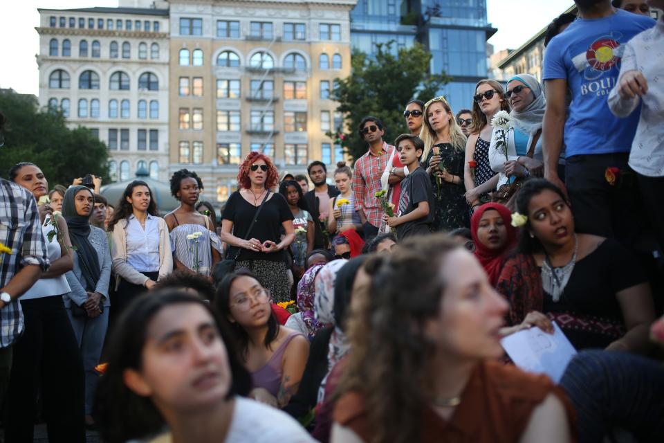 People attend a vigil in Union Square in New York City.&nbsp;