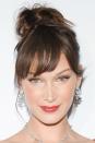 <p>One of many of Bella Hadid's beauty looks from Cannes featured this faux fringe, styled into a high messy bun which made the look less 'lady' and more cool girl. </p>