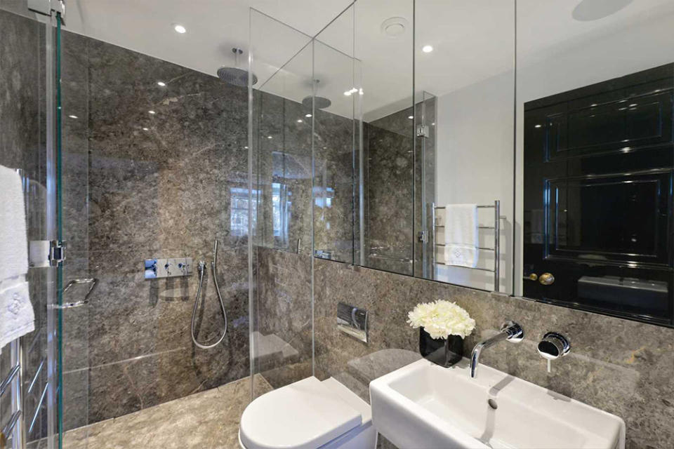 <p>All bathrooms are covered in wall-to-floor italian marble unique and different to each bathroom. So luxe. Source: Rokstone </p>