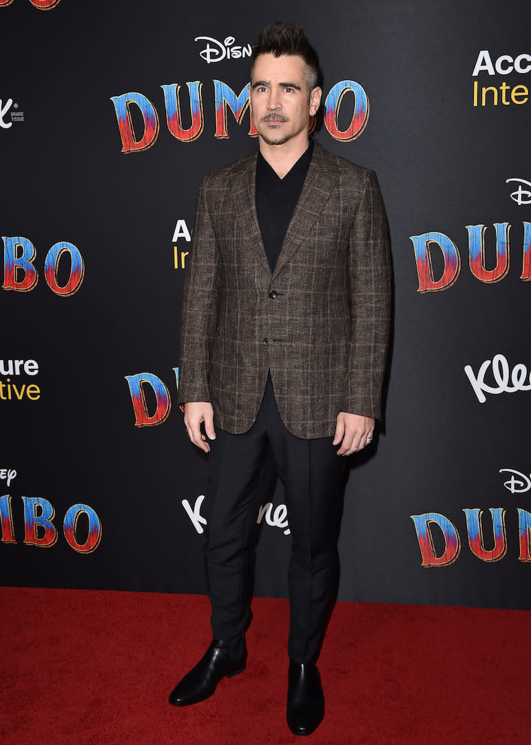 <p>Colin Farrell chose a tweed jacket and Chelsea boots for the starry photocall. <em>[Photo: Getty]</em> </p>