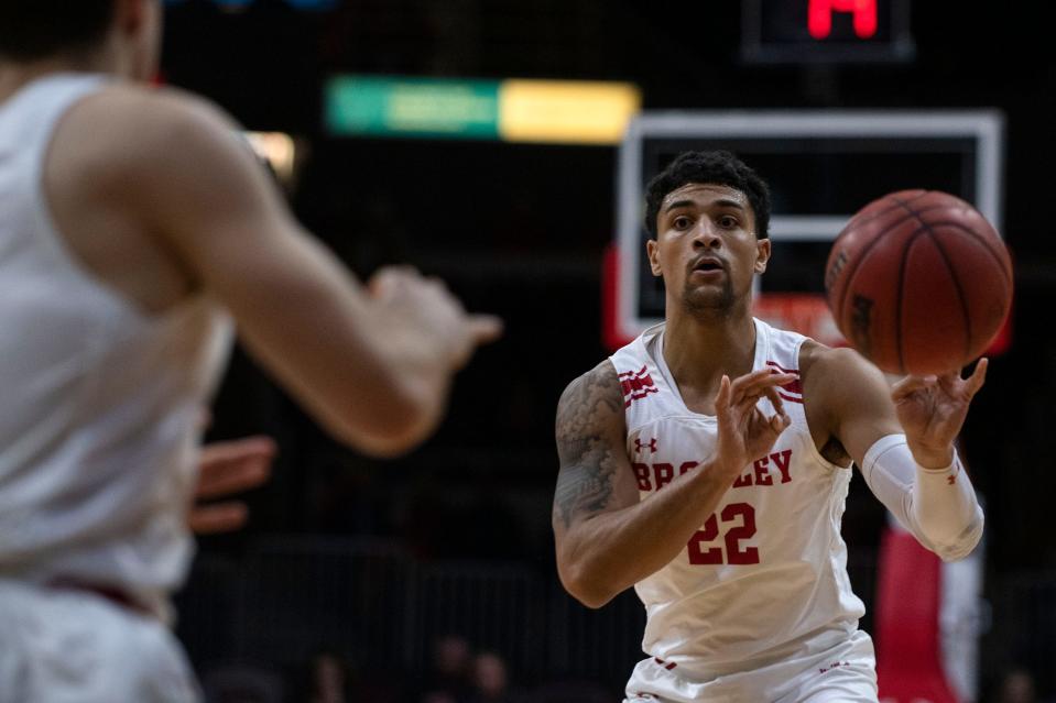 Bradley's Ja'Shon Henry passes the ball to Connor Hickman during the Missouri Valley Conference opener against Northern Iowa at Carver Arena on Dec. 1, 2021. Bradley scored in the final seconds of the game, beating the Panthers 71-69.