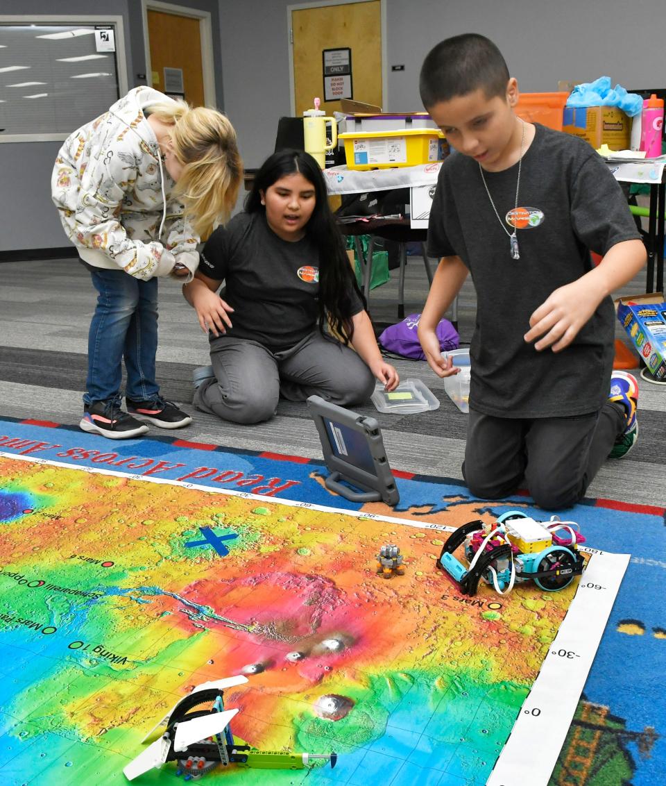 5th grade students from Riviera Team I practice for the Mission Robotic Rover Spike Prime as part of Destination Mars, a challenge supported by a Boeing grant. Left to right, Lilly Vanta, Mikaela Saac, and Edgardo Hernandez. The challenge event was held at the Brevard Public Schools Educational Services Facility. Fifth and Sixth graders from four schools participated. The schools were: Cambridge, Cape View, Challenger, and Riviera elementary schools.