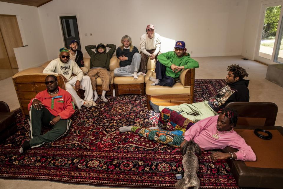 Brockhampton members sit around and relax.