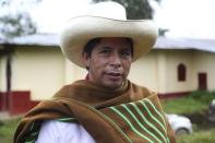 FILE - Free Peru party presidential candidate Pedro Castillo poses for a photo on his land in Chugur, Peru, April 16, 2021. Castillo, a rural schoolteacher, had never held office before winning a runoff election in June 2021 after campaigning on promises to nationalize Peru’s key mining industry and rewrite the constitution, winning wide support in the impoverished countryside. (AP Photo/Martin Mejia, File)