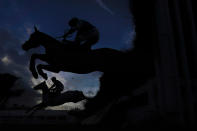 PLUMPTON, ENGLAND - JANUARY 03: A general view as runners clear a fence during The Sky Sports Racing Virgin 535 Handicap Chase at Plumpton Racecourse on January 03, 2021 in Plumpton, England. Due to the Coronavirus pandemic, owners along with the paying public will not be allowed to attend the meeting. (Photo by Alan Crowhurst/Getty Images)