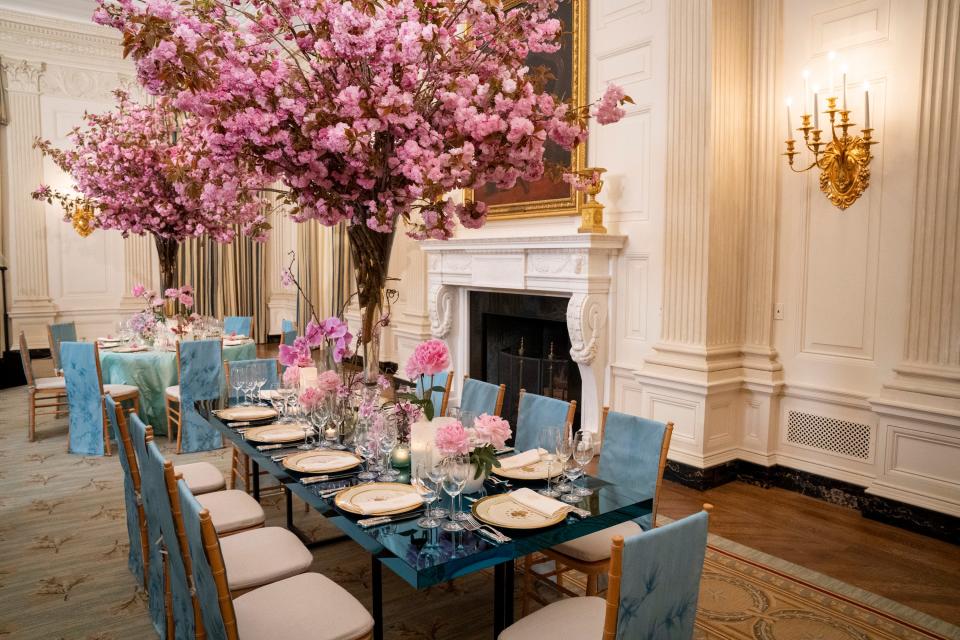 Place settings and decorations adorn the tables as first lady Jill Biden hosts a preview of Wednesday's State Dinner to honor South Korean President Yoon Suk-Yeol.