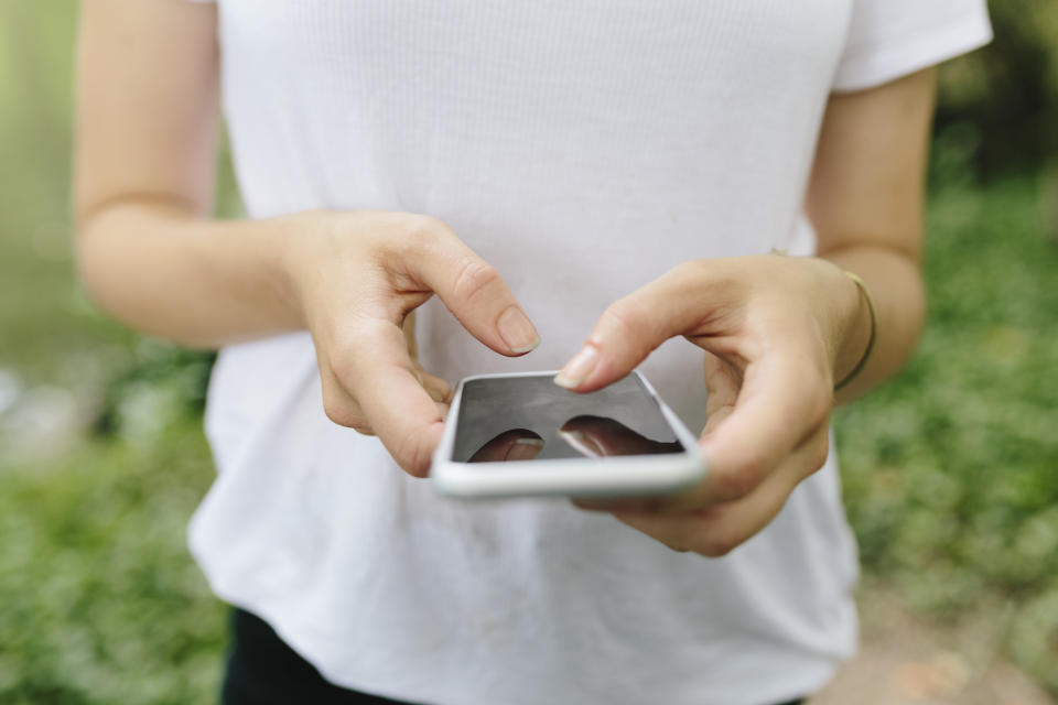 Close-up of woman using a cell phone