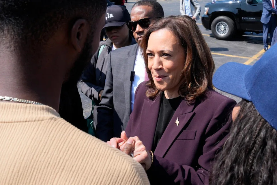 Kamala Harris greets supporters before boarding Marine Two at Soldier Field in Chicago. A Republican group has argued that she’s ineligible to be president (AP)