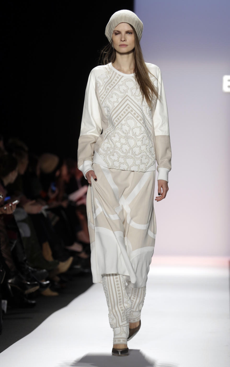 The BCBG Max Azria Fall 2013 collection is modeled during Fashion Week in New York on Thursday, Feb. 7, 2013. (AP Photo/Richard Drew)