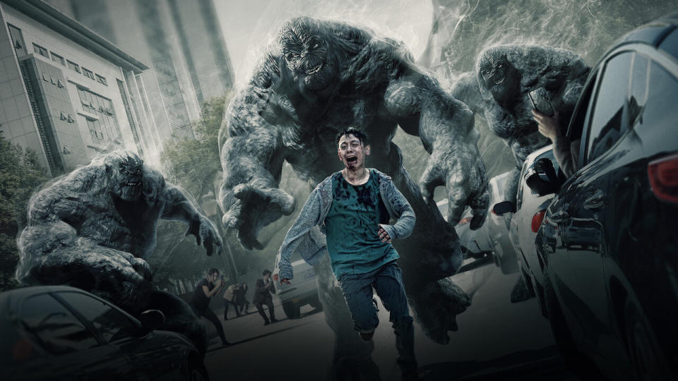 A promo shot from the Netflix K-Drama Hellbound reveals a man running from giant demons