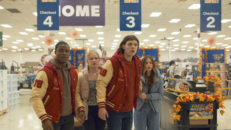 This image released by Sony Pictures shows, from left, Gabriel Davenport, Jenna Warren, Tomaso Sanelli, and Addison Rae in a scene from the horror film "Thanksgiving." (Sony Pictures via AP)