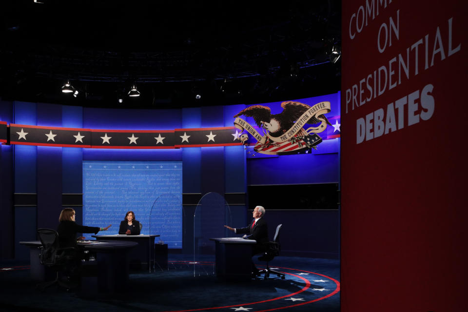 SALT LAKE CITY, UTAH - OCTOBER 07: Democratic vice presidential nominee Sen. Kamala Harris (D-CA) and U.S. Vice President Mike Pence participate in the vice presidential debate moderated by Washington Bureau Chief for USA Today Susan Page (L) at the University of Utah on October 7, 2020 in Salt Lake City, Utah. The vice presidential candidates only meet once to debate before the general election on November 3. (Photo by Alex Wong/Getty Images)