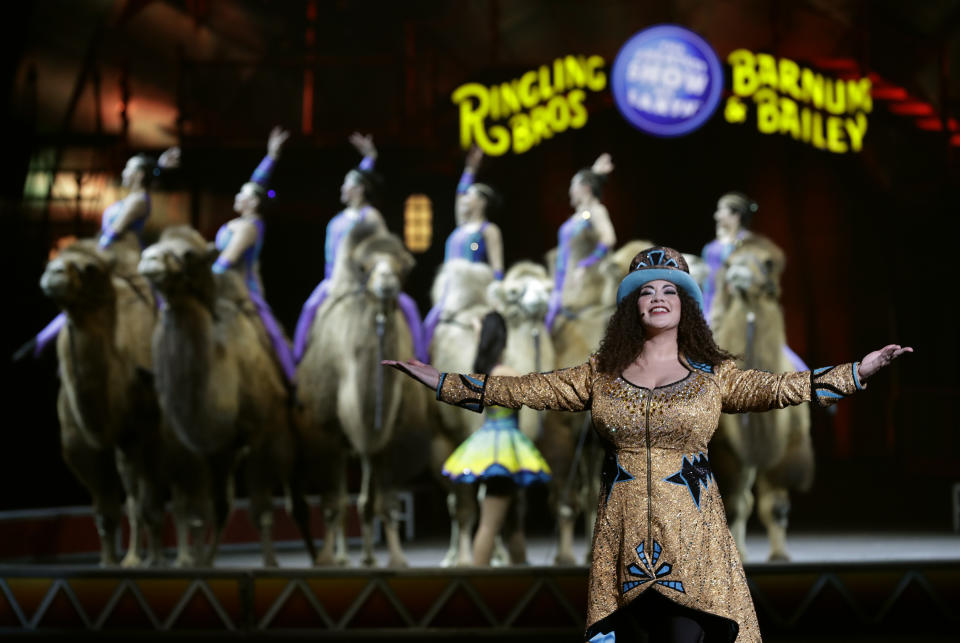 Ringling Bros. and Barnum & Bailey Ringmaster Kristen Michelle Wilson performs Saturday, Jan. 14, 2017, in Orlando, Fla. The Ringling Bros. and Barnum & Bailey Circus will end the "The Greatest Show on Earth" in May, following a 146-year run of performances. Kenneth Feld, the chairman and CEO of Feld Entertainment, which owns the circus, told The Associated Press. Declining attendance combined with high operating costs are among the reasons for closing. (AP Photo/Chris O'Meara)