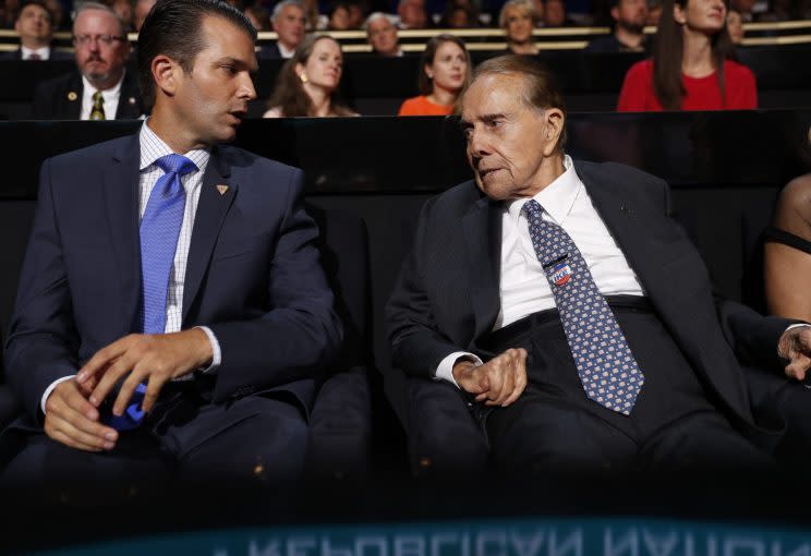 Donald Trump Jr. talks with former Sen. Bob Dole, the party's 1996 nominee, in Trump's box at the Republican National Convention. (Photo: Jonathan Ernst)