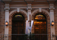 This May 28, 2020 photo shows an entrance to the Holy Rosary Roman Catholic Church in Jersey City, N.J. Samier Tadros, 46, claims Bishop Nicholas DiMarzio, who was assigned to the church, “repeatedly sexually abused” him starting when he was about 6 years old, according to a March 9, 2020 letter that Tadros' lawyer sent to the Archdiocese of Newark. Tadros has asked for $20 million in compensation. DiMarzio’s lawyer said the accusation is not true and that DiMarzio will never agree to a settlement. (AP Photo/Jessie Wardarski)