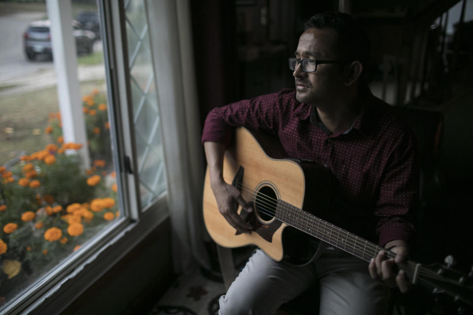 Amber Subba plays music at home in Cuyahoga Falls, Ohio.