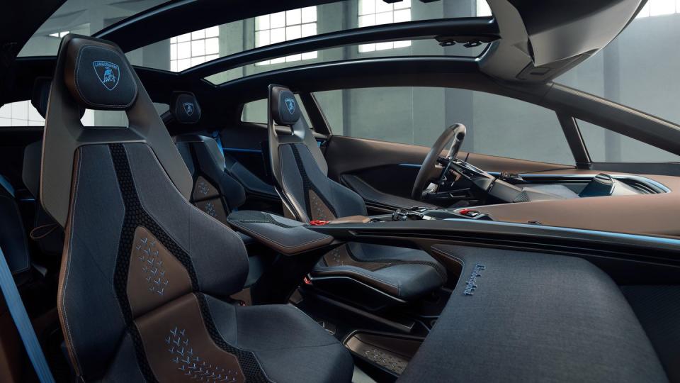2028 lamborghini lanzador interior in blue paint and grey nylon with studio photography background behind it