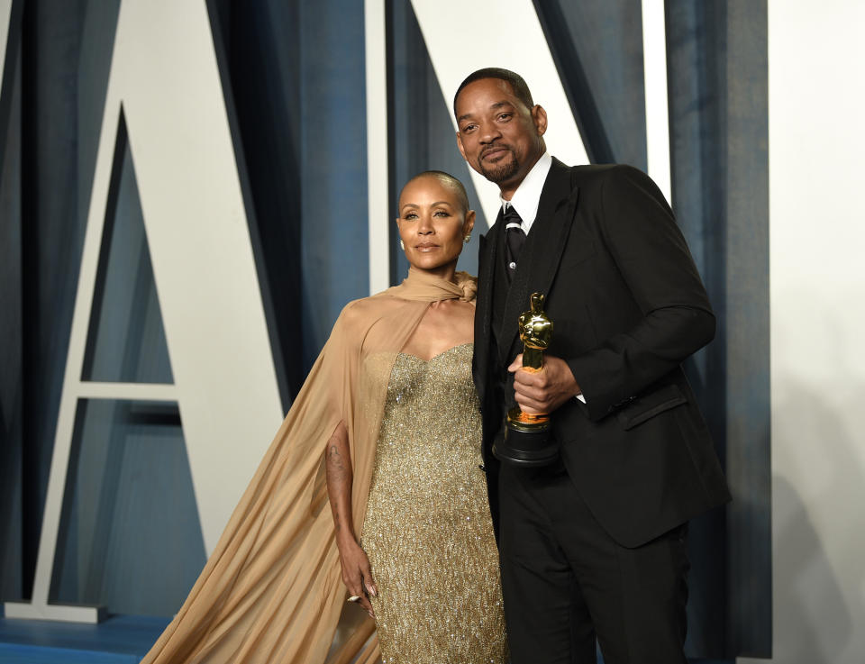 Jada Pinkett Smith, left, and Will Smith arrive at the Vanity Fair Oscar Party on Sunday, March 27, 2022, at the Wallis Annenberg Center for the Performing Arts in Beverly Hills, Calif. (Photo by Evan Agostini/Invision/AP)