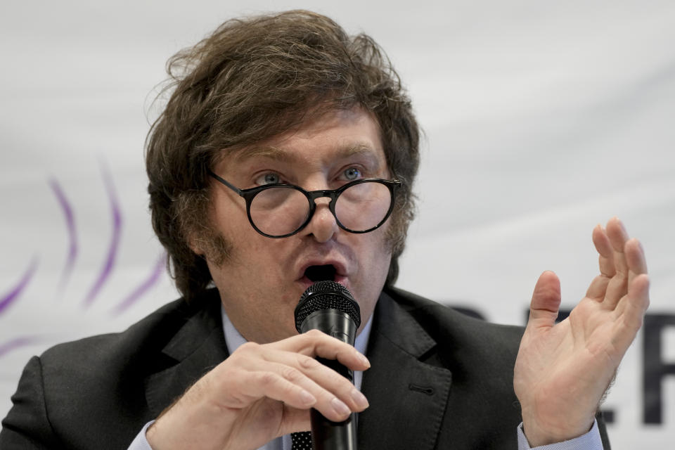 Presidential hopeful Javier Milei gives a press conference in Buenos Aires, Argentina, Wednesday, Oct. 11, 2023. Milei spoke after Argentine President Alberto Fernandez denounced him for having fueled the sharp devaluation of the peso with his recommendations to avoid saving and investing with the national currency. (AP Photo/Natacha Pisarenko)